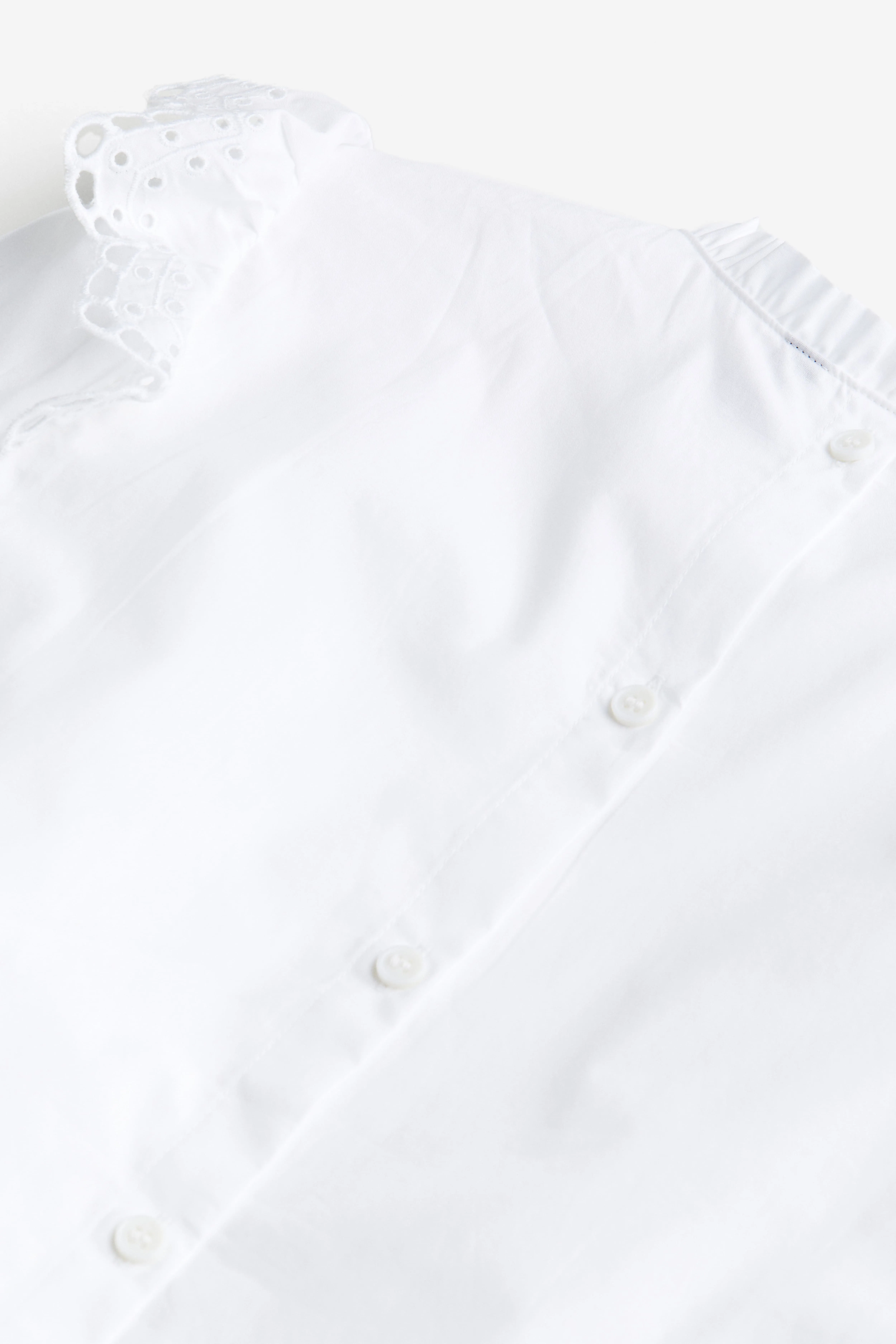 Broderie-anglaise-detail ruffled blouse - Long sleeve - Regular length - White - Ladies | H&M GB